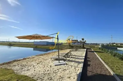 Lote área central do condomínio beira lago pronto para construir