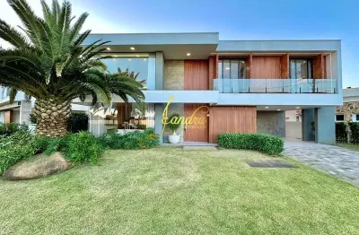 Sobrado beira lago,  mobiliado e decorado com 05 suítes sacada/piscina