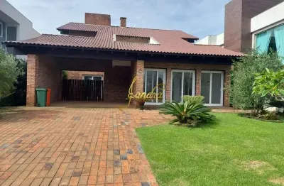 Sobrado semi-mobiliado  em atlântida em condomínio fechado