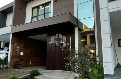 Casa em condomínio fechado com 3 suítes - beira rio - biguaçu