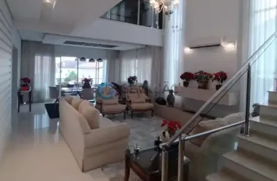 Sobrado em condomínio fechado de 04 dorm. e 04 suítes - 532,00m² no jardim das colinas