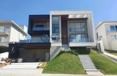 Casa em condomínio com 04 suítes - 900m² no reserva do paratehy - urbanova