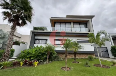 Casa mobiliada em condomínio para venda com 5 suítes e 4 vagas de garagem com 480m² - urbanova