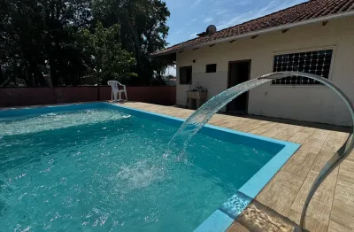 Linda casa com piscina temporada praia de barra velha por r$ 1.300,00/dia