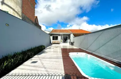 Casa com piscina á venda - 2 dormitórios – 75m² – r$ 499.000 – costeira – são josé dos pinhais/pr