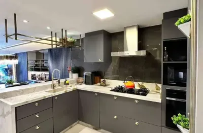 Apartamento à venda, mobiliado, com vista mar, 2 quartos, sendo uma suíte master com closet, 2 vagas, amores da brava club house, praia brava, itajaí sc