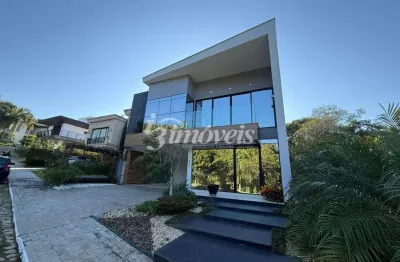 Luxuosa casa à venda, pronta para morar, 4 quartos sendo 1 suíte e 2 demi, 4 vagas, piscina privativa, condomínio haras rio do ouro, bairro ariribá, balneário camboriú-sc