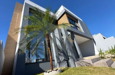 Casa com 3 quartos à venda na avenida olivo tauffer, 549, desbravador, chapecó por r$ 1.300.000