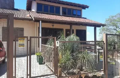 Casa com 3 quartos à venda na aquliles tomazeli, 307, centro, chapecó por r$ 2.000.000