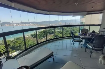 Apartamento no guarujá no edifício tortuga com vaga náutica pé na areia apartamento de frente para praia
