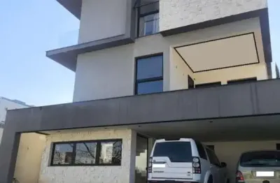 Belissima sobrado moderno a venda na aldeia da serra em um condominio seleto de residencias modernas.