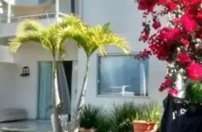 Casa com 4 quartos à venda na Avenida Praia de Itapoan, Miragem, Lauro de Freitas por R$ 850.000