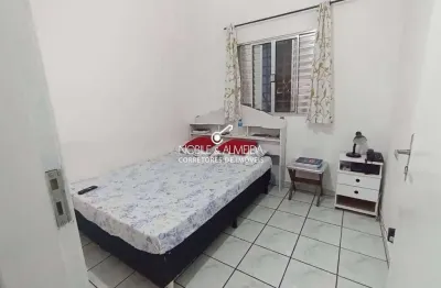 Casa à venda na Avenida Juscelino Kubitschek de Oliveira, Caiçara, Praia Grande - SP