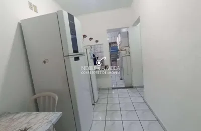 Casa à venda na Avenida Juscelino Kubitschek de Oliveira, Caiçara, Praia Grande - SP