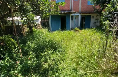 Terreno com 1155m2  , para edificar ou morar com duas casas,e 02 casas antigas em gravatai/ rs.