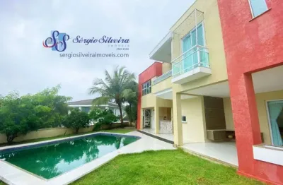 Casa no alphaville fortaleza, com 4 suítes, piscina com hidro, varanda gourmet.
