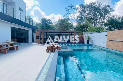 Casa de alto padrão modiliada com 4 suítes piscina e área gourmet completa