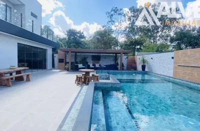 Casa de alto padrão modiliada com 4 suítes piscina e área gourmet completa