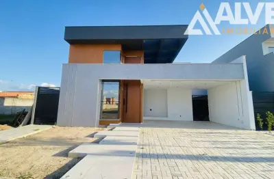 Casa com 3 suítes e áera com gourmet em condomínio de alto padrão