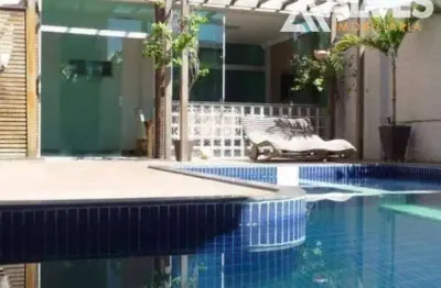 Casa de alto padrão com 5 suítes piscina área gourmet e academia privativa