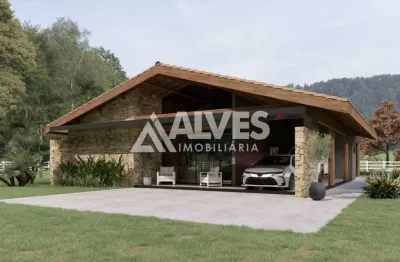 Casa de campo com 3 quartos sendo 1 suíde e área gourmet em condomínio