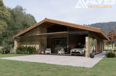 Casa de campo com 3 quartos sendo 1 suíde e área gourmet em condomínio