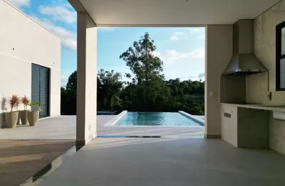 Casa com 4 quartos, 250 m² - venda por R$ 2.399.000 ou aluguel por R$ 20.000/mês - Condomínio Terras Di Leonardi - Itu/SP