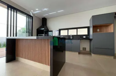 Próximo ao espaço de lazer, casa térrea com 4 suítes completa.