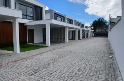 Geminados modernos em condomínio fechado no bairro vila nova