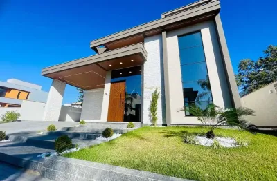 Casa nova em condomínio fechado com 3 suítes na praia dos ingleses em florianópolis