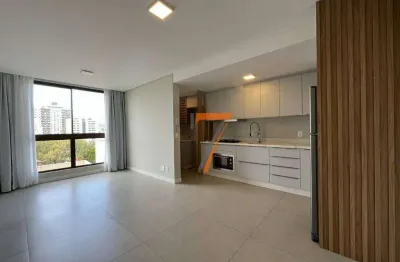 Apartamento com 2 dormitórios para alugar, 64 m² por r$ 5.870,00/mês - balneário - florianópolis/sc