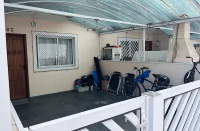 Casa em condomínio fechado com 2 quartos à venda na Avenida Minas Gerais, 519, Vila Voturua, São Vicente