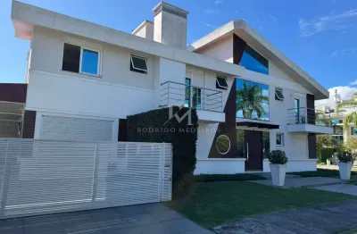 Casa 4 suites á 250 metros do mar  jurerê internacional - florianópolis - sc
