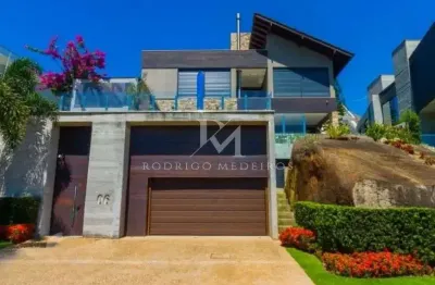 Casa de alto padrão à venda no cacupé, florianópolis/sc, com 3 suítes e vista para o mar