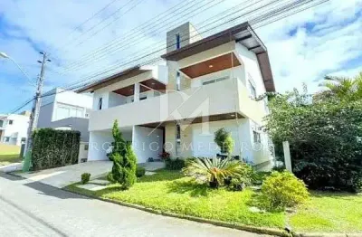 Casa à venda no campeche, florianópolis, em condomínio com 5 suítes e lazer completo