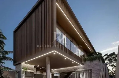 Casa de alto padrão à venda no vivapark, porto belo. arquitetura contemporânea, 4 suítes e área de lazer com piscina.