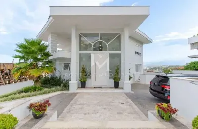 Casa em condomínio com 4 suítes e vista para o mar no Bosque das Mansões, São José