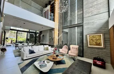 Casa em condomínio frente mar com 5 suítes em Cacupé, Florianópolis/SC