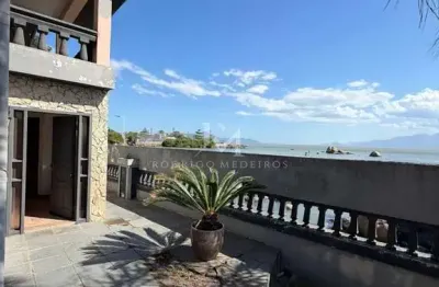 Casa pé na areia com 6 quartos à venda em Coqueiros, Florianópolis