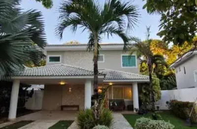 Casa em condomínio fechado com 4 quartos para alugar na rua lagoa branca, 1, alphaville (abrantes), camaçari por r$ 15.000
