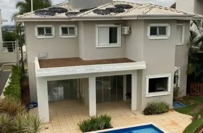 Sobrado para locação de alto padrão, com 04 suites com piscina e espaço gourmet – 282m² no condomin