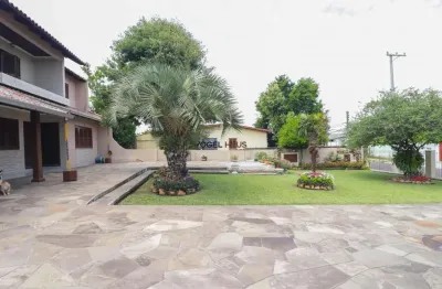 Casa com 4 quartos à venda na Rua Ney Brito, 140, Nossa Senhora das Graças, Canoas