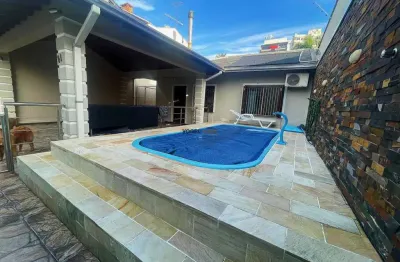 Casa semimobiliada térrea 03 dormitórios com casa auxiliar 02 dormitórios em canoas|bairro centro