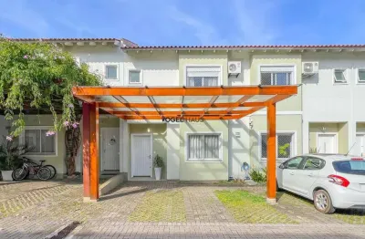 Residencial medianeira ii: sobrado em condomínio à venda em canoas - área de serviço e churrasqueira