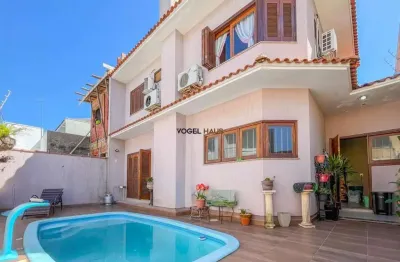 Sobrado 3 dormitórios e com piscina, bairro mont´serrat - canoas.