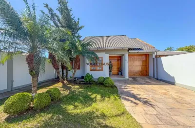 Casa térrea com 4 dormitórios e com piscina no bairro niterói - canoas.
