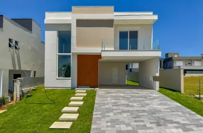 Casa em condomínio no condomínio reservas do lago clube, em nova santa rita.