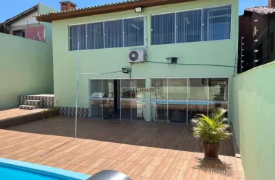 CASA  COM 3  QUARTOS  E 3 BANHEIROS  a Venda, 319 m² por R$ 750.000.em GRAVATAI.