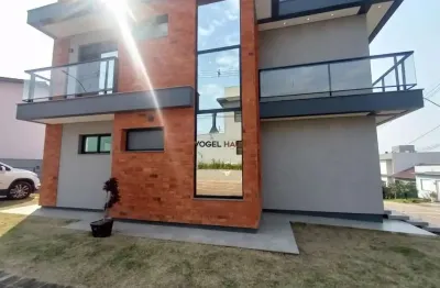 CASA COM 3 QUARTOS 1 SUITE VAGA PARA 2 CARROS A VENDA, CONDOMINIO AGUAS CLARAS, GRAVATAI por R$ 599.900