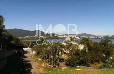 Terreno em condomínio fechado à venda na rodovia haroldo soares glavan, 910, cacupé, florianópolis por r$ 1.600.000